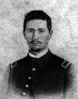 Black and white photograph taken circa 1863 of then 2nd Lieutenant Eli P. Bicknell of Company C, 80th Indiana, in his officer's uniform