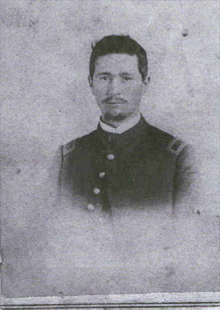 Black and white photograph taken circa 1863 of then 2nd Lieutenant Eli P. Bicknell of Company C, 80th Indiana, in his officer' s uniform